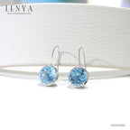 LENYA ต่างหูพลอยบลู โทปาซ (Blue Topaz) สีฟ้าเสริมดวงเรื่องหน้าที่การงาน มีผู้สนับสนุนอุปถัมภ์ค่อยให้การช่วยเหลือ  ตัวเรือนเงินแท้ชุบทองคำขาว