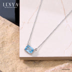 LENYA สร้อยคอเงินแท้ 925 ประดับอัญมณีสีฟ้าใส (Blue Topaz) ดีไซน์สี่เหลี่ยมผืนผ้า ขนาดเหมาะเจาะ ช่วยขับให้ลำคอดูเรียวยาว สง่างามดั่งพญาหงส์ผู้งดงาม