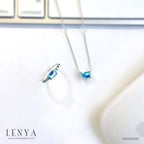 LENYA สร้อยคอเงินแท้ 925 ประดับอัญมณีสีฟ้าใส (Blue Topaz) ดีไซน์สี่เหลี่ยมผืนผ้า ขนาดเหมาะเจาะ ช่วยขับให้ลำคอดูเรียวยาว สง่างามดั่งพญาหงส์ผู้งดงาม