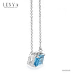 LENYA สร้อยคอเงินแท้ 925 ประดับอัญมณีสีฟ้าใส (Blue Topaz) ดีไซน์สี่เหลี่ยมผืนผ้า ขนาดเหมาะเจาะ ช่วยขับให้ลำคอดูเรียวยาว สง่างามดั่งพญาหงส์ผู้งดงาม