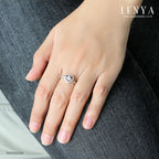 LENYA แหวนเพชร DiamondLike ดีไซน์รูปหัวใจล้อมเพชรเม็ดหลัก พร้อมชูเพชรเม็ดกลางให้โดดเด่นขึ้น ตัวเรือนเงินแท้ชุบทองคำขาว
