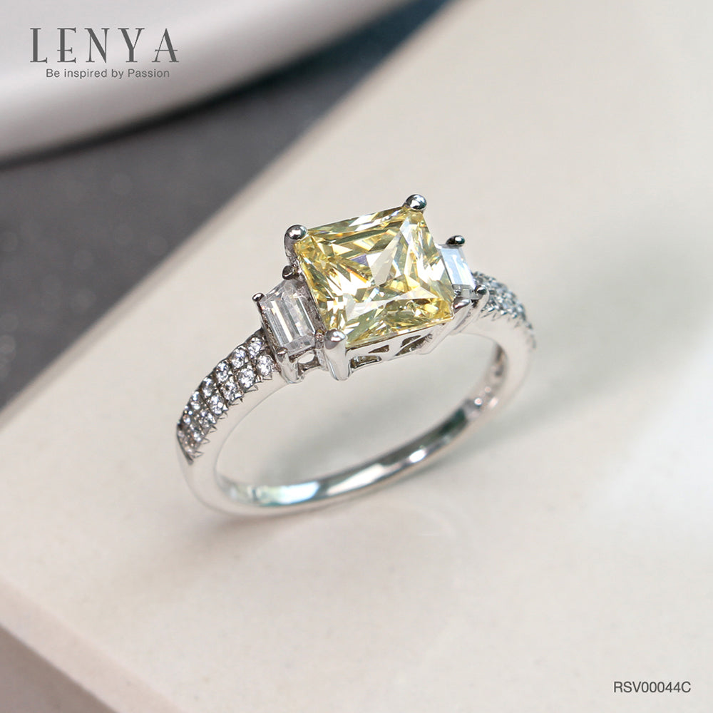 LENYA แหวนเพชร DiamndLike สีแฟนซีทรง Princess เม็ดใหญ่ มาพร้อม คิวบิคเซอร์โคเนีย ที่บ่าข้างประกบเพิ่มความเปร่งประกาย ลงตัวกับเรือนเงินแท้ ชุบทองคำขาว เจิดจรัญทุกงานสำคัญ
