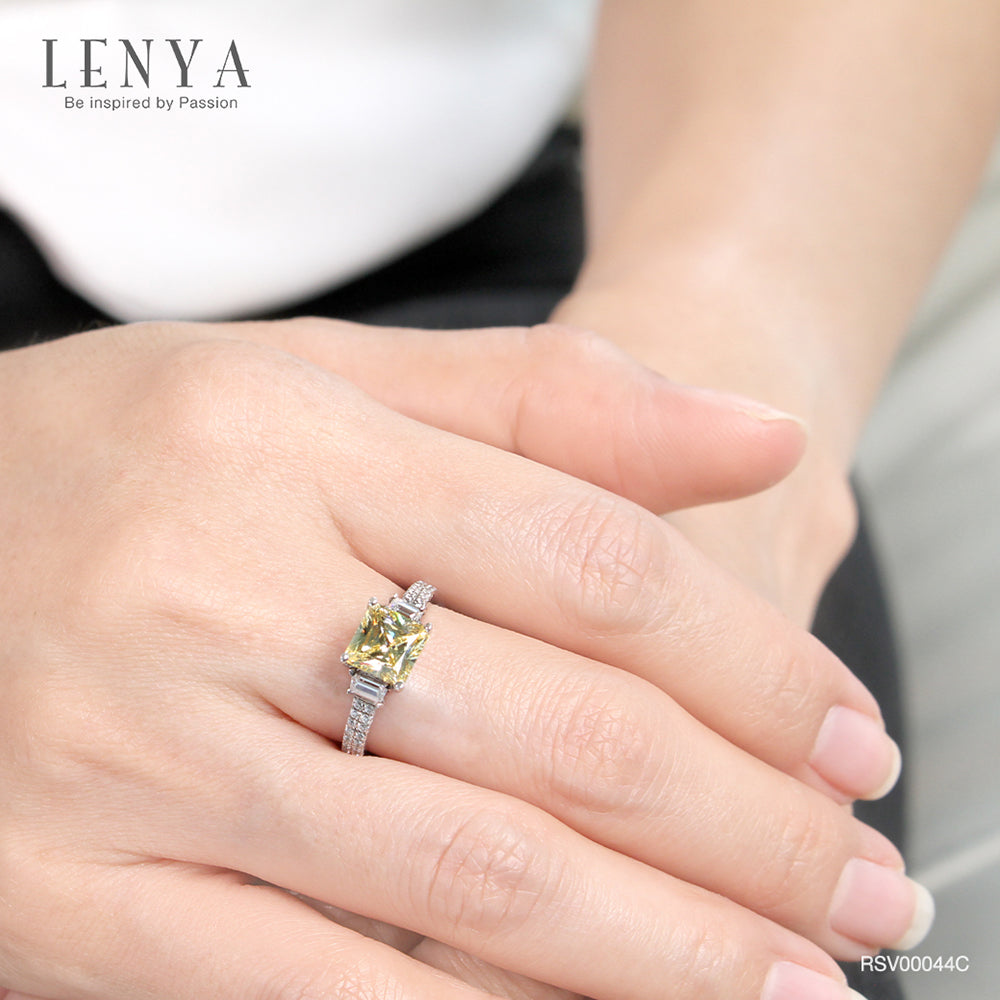LENYA แหวนเพชร DiamndLike สีแฟนซีทรง Princess เม็ดใหญ่ มาพร้อม คิวบิคเซอร์โคเนีย ที่บ่าข้างประกบเพิ่มความเปร่งประกาย ลงตัวกับเรือนเงินแท้ ชุบทองคำขาว เจิดจรัญทุกงานสำคัญ