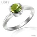 LENYA แหวนพลอยเพอริดอท (Peridot) พลอยหลังเบี้ย ปกป้องคุ้มครองเสริมสิริมงคล ความโชคดี นำพาความเจริญรุ่งเรืองในชีวิต หัวแหวนดีไซน์เป็นกลีบดอกไม้ ตัวเรือนเงินแท้ชุบทองคำขาว