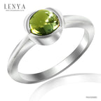 LENYA แหวนพลอยเพอริดอท (Peridot) พลอยหลังเบี้ย ปกป้องคุ้มครองเสริมสิริมงคล ความโชคดี นำพาความเจริญรุ่งเรืองในชีวิต หัวแหวนดีไซน์เป็นกลีบดอกไม้ ตัวเรือนเงินแท้ชุบทองคำขาว