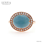 LENYA แหวนอะความารีน(Aquamarine)ช่วยปกป้องคุ้มครองในเรื่องการเดินทาง เพิ่มเสน่ห์เรื่องการพูดคุยเจรจาต่อรอง ให้บรรลุเป้าหมายและประสบผลสำเร็จ ล้อมด้วยเพชร DiamondLike ตัวเรือนเงินแท้ชุบสีพิงค์โกลด์(Pink Gold)