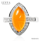 LENYA แหวนเงินแท้ 925 ดีไซน์สุดเก๋ ประดับหินสีส้มคาร์เนเลียน (Carnelian )เป็นหินแห่งคำอวยพรให้พบเจอแต่ความสุข ความเจริญก้าวในชีวิต เสริมบารมีและเปล่งประกายระยิบระยับด้วยคิวบิกเซอร์โคเนีย ตัวเรือนชุบทองคำขาว