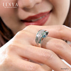 LENYA แหวน บลูโทแพซ(Blue Topaz) เพิ่มระยิบระยับด้วย คิวบิกเซอร์โคเนีย (Cubic Zirconia) สีขาวเม็ดเล๊กๆ ตัวเรือนเงินแท้ 925 ชุบทองคำขาว