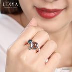 LENYA แหวนบลูโทแพซ (Sky Blue Topaz) เจียระไนหลังเบี้ย ประดับซาโวไรท์ ตัวเรือนเงินแท้ 925 ชุบโรเดียม