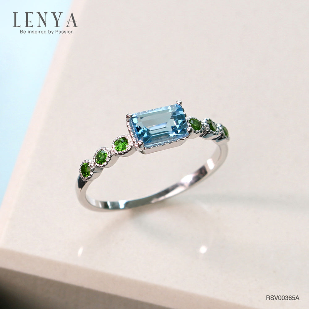 LENYA แหวนเงินแท้ 925 ชุปทองคำขาว ประดับพลอย สีฟ้า บลูโทแพซ(Blue Topaz) รูปทรงสี่เหลี่ยม ดูมีสไตล์ และเสริมแต่งด้วย สีเขียว โครม ไดออฟไซต์ (chrome Diopside)  เพิ่มความโดดเด่นอย่างสวยงาม