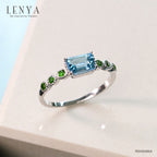 LENYA แหวนเงินแท้ 925 ชุปทองคำขาว ประดับพลอย สีฟ้า บลูโทแพซ(Blue Topaz) รูปทรงสี่เหลี่ยม ดูมีสไตล์ และเสริมแต่งด้วย สีเขียว โครม ไดออฟไซต์ (chrome Diopside)  เพิ่มความโดดเด่นอย่างสวยงาม