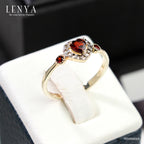 LENYA แหวนเงินแท้ 925 สุดเก๋กับดีไซน์ พลังแห่งความรัก ตัวเรือนชุปทอง 18 เค (18k Gold) ประดับด้วยพลอยสีแดง การ์เน็ต (Garnet) รอบล้อมหัวใจด้วยพลอยสีขาว ไวท์ โทแพซ (White Topaz )
