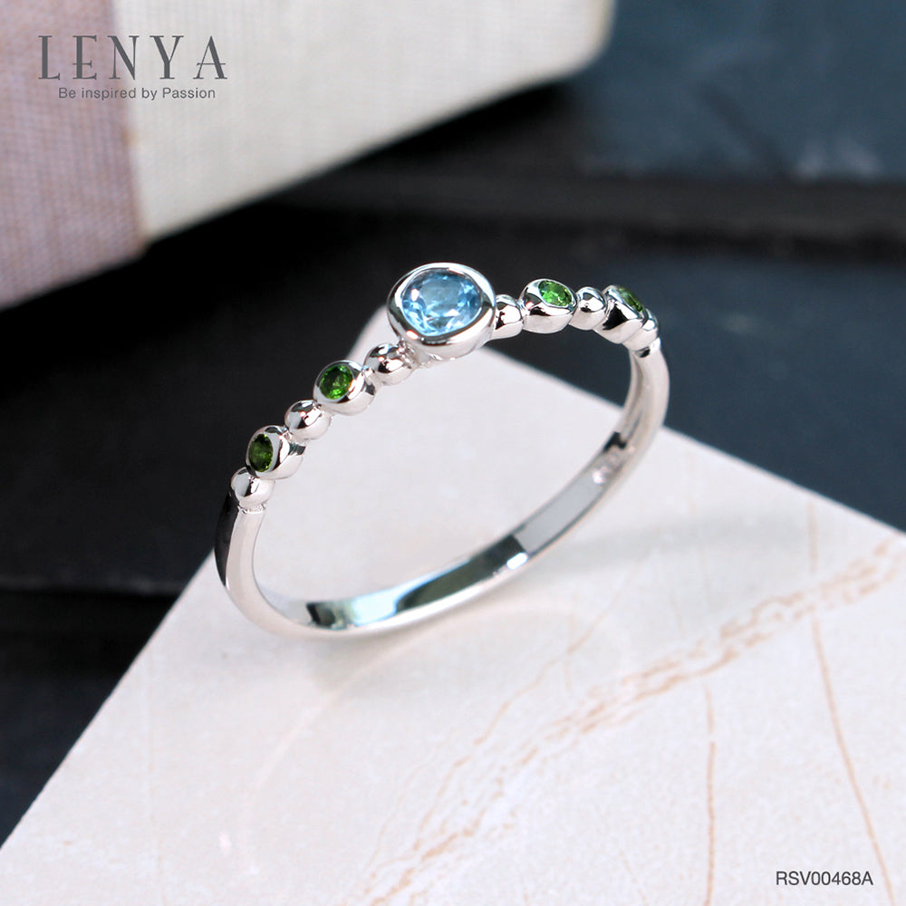 LENYA แหวนเงินแท้ ประดับบลูโทแพซ (Blue Topaz) และซาโวไรท์ (Tsavorite) ตัวเรือนชุบโรเดียม