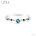 LENYA แหวนเงินแท้ ประดับบลูโทแพซ (Blue Topaz) และซาโวไรท์ (Tsavorite) ตัวเรือนชุบโรเดียม