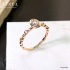 LENYA แหวนเงินแท้ ดีไซน์สุดเก๋ดูโดดเด่น ด้วยพลอยรูปไข่กรีนอเมทิสต์ (Green Amethyst)  และแซปไฟร์สีชมพู (Pink sapphire) ตัวเรือนชุบพิ้งโกล์ด