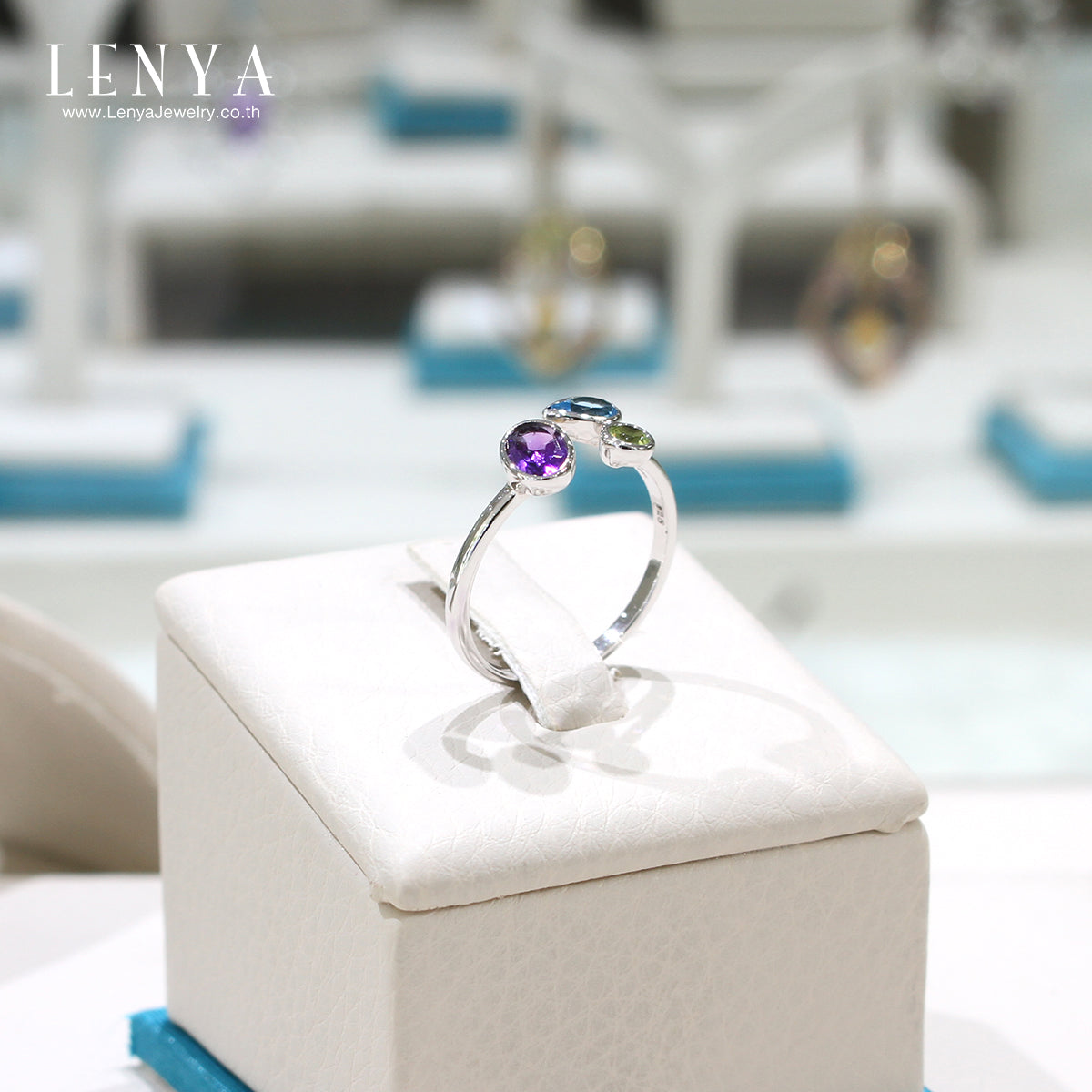 LENYA แหวนเงินแท้ ประดับอเมทีสต์ (Amethyst) สีม่วงรูปไข่ โทแพซสีฟ้า (Blue Topaz) ทรงหยดน้ำ และเพอริดอต (Peridot) สีเขียว ตัวเรือนชุบโรเดียม