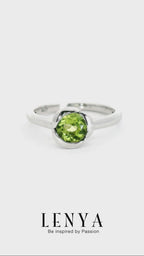 LENYA แหวนพลอยเพอริดอท (Peridot) ปกป้องคุ้มครองเสริมสิริมงคล ความโชคดี นำพาความเจริญรุ่งเรืองในชีวิต หัวแหวนดีไซน์เป็นกลีบดอกไม้ ตัวเรือนเงินแท้ชุบทองคำขาว