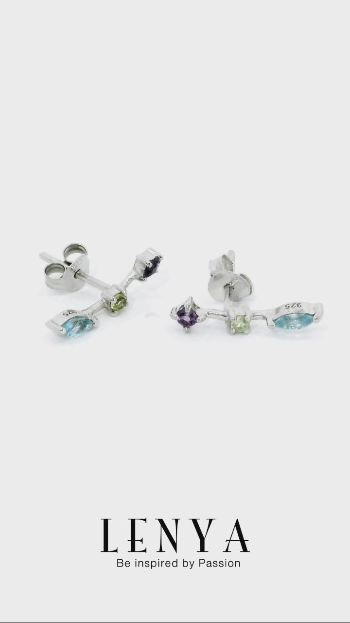 LENYA ต่างหูตัวเรือนเงินแท้ 925 ชุบทองขาว ประดับด้วยพลอย บลูโทแพซ(Blue Topaz) อเมทีสต์ (Amethyst) และ เพอริดอท(Peridot) สีสันสดใส ใส่แล้วน่ารัก ดูสวยไปกว่าเดิม