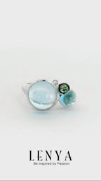 LENYA แหวนบลูโทแพซ (Sky Blue Topaz) เจียระไนหลังเบี้ย ประดับซาโวไรท์ ตัวเรือนเงินแท้ 925 ชุบโรเดียม