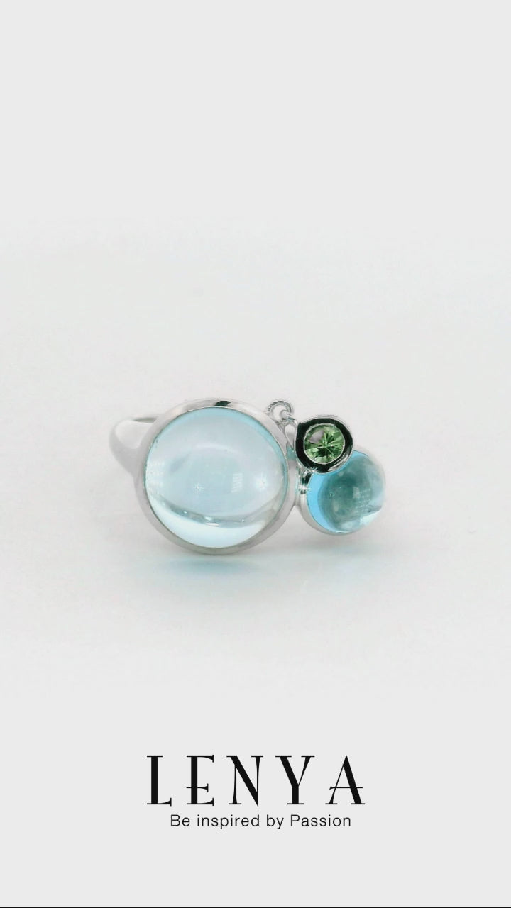 LENYA แหวนบลูโทแพซ (Sky Blue Topaz) เจียระไนหลังเบี้ย ประดับซาโวไรท์ ตัวเรือนเงินแท้ 925 ชุบโรเดียม
