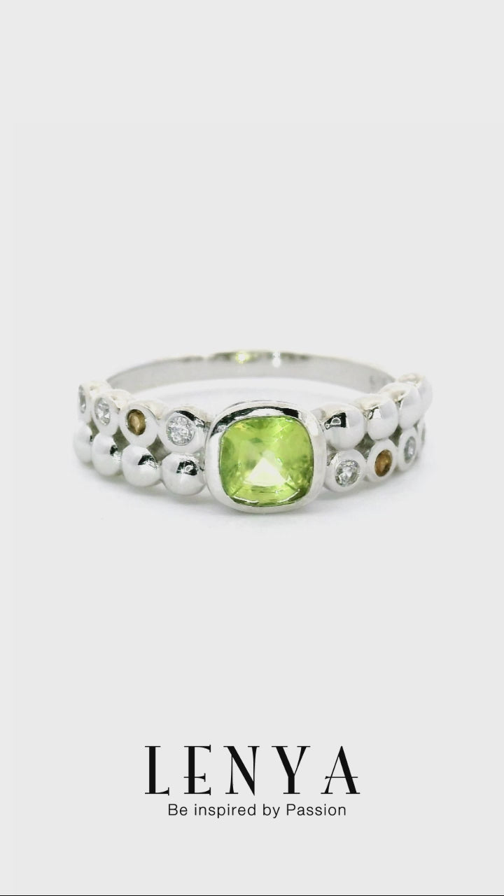 LENYA แหวนเงินแท้ ชุบทองขาว ประดับพลอยสีเขียวเพอริดอท(Peridot) ทรงสี่เหลี่ยม เม็ดกลมเล็กสีเหลือง ซิทริน ( Citrine) และ คิวบิกเซอร์โคเนีย (Cubic Zirconia) ดีไซน์สุดเก๋ เท่ห์แบบไม่ซ้ำใคร
