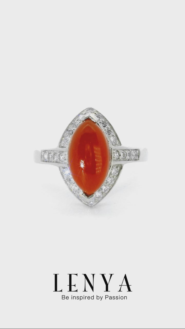 LENYA แหวนเงินแท้ 925 ดีไซน์สุดเก๋ ประดับหินสีส้มคาร์เนเลียน (Carnelian )เป็นหินแห่งคำอวยพรให้พบเจอแต่ความสุข ความเจริญก้าวในชีวิต เสริมบารมีและเปล่งประกายระยิบระยับด้วยคิวบิกเซอร์โคเนีย ตัวเรือนชุบทองคำขาว